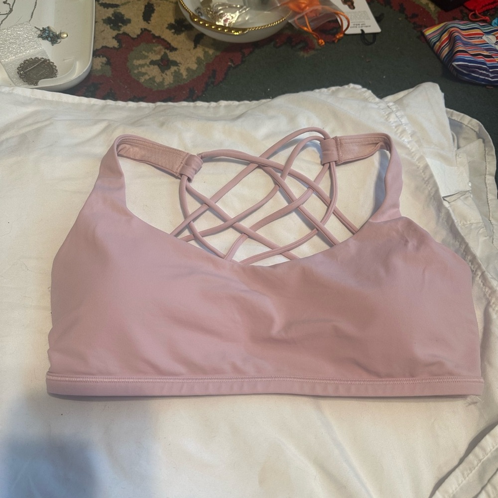Lululemon Athletica  Pink Haze  Crisscross Sports Bra. Worn. Once size 8